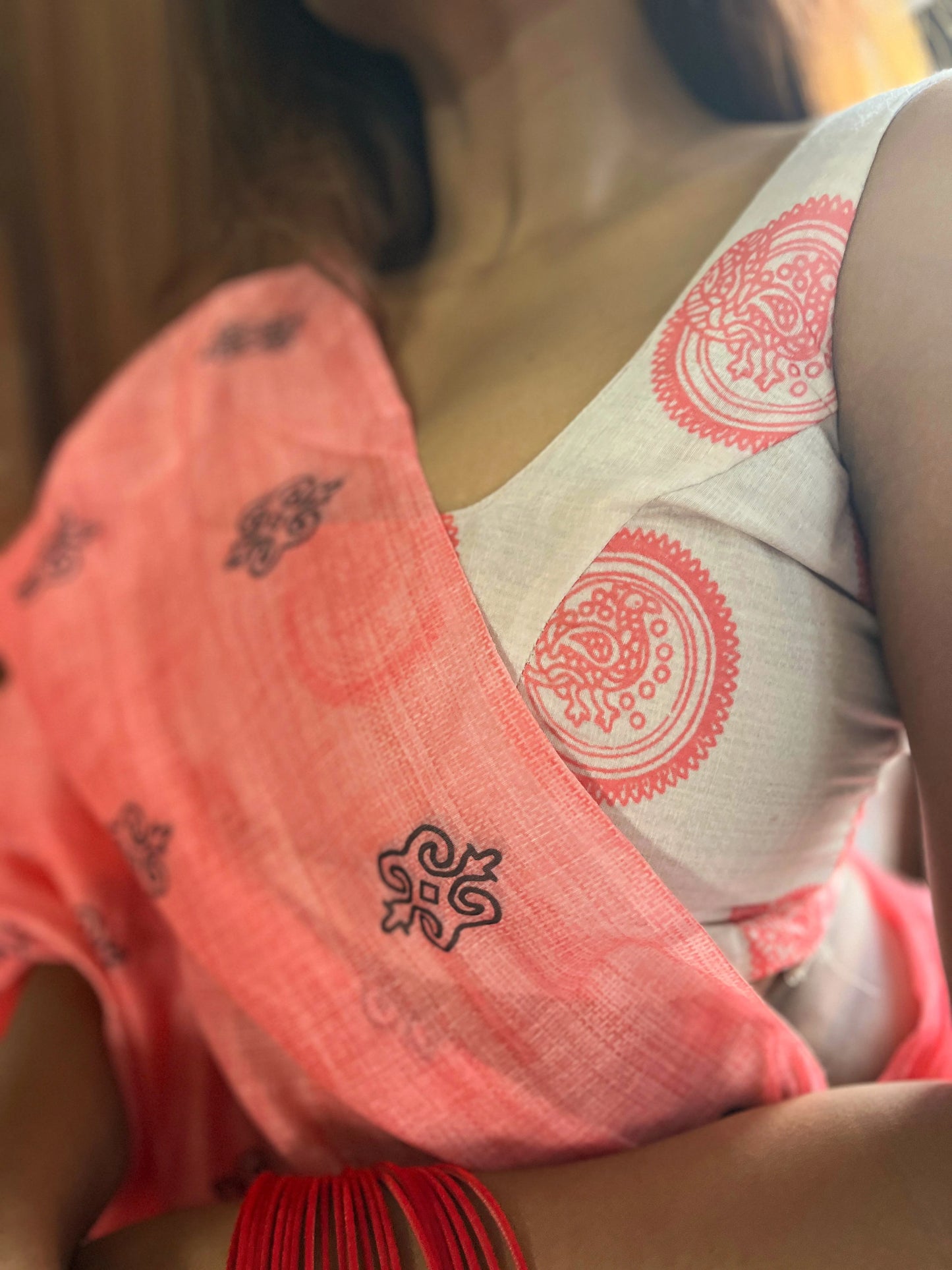 Pink Saree Paired with White Printed Blouse