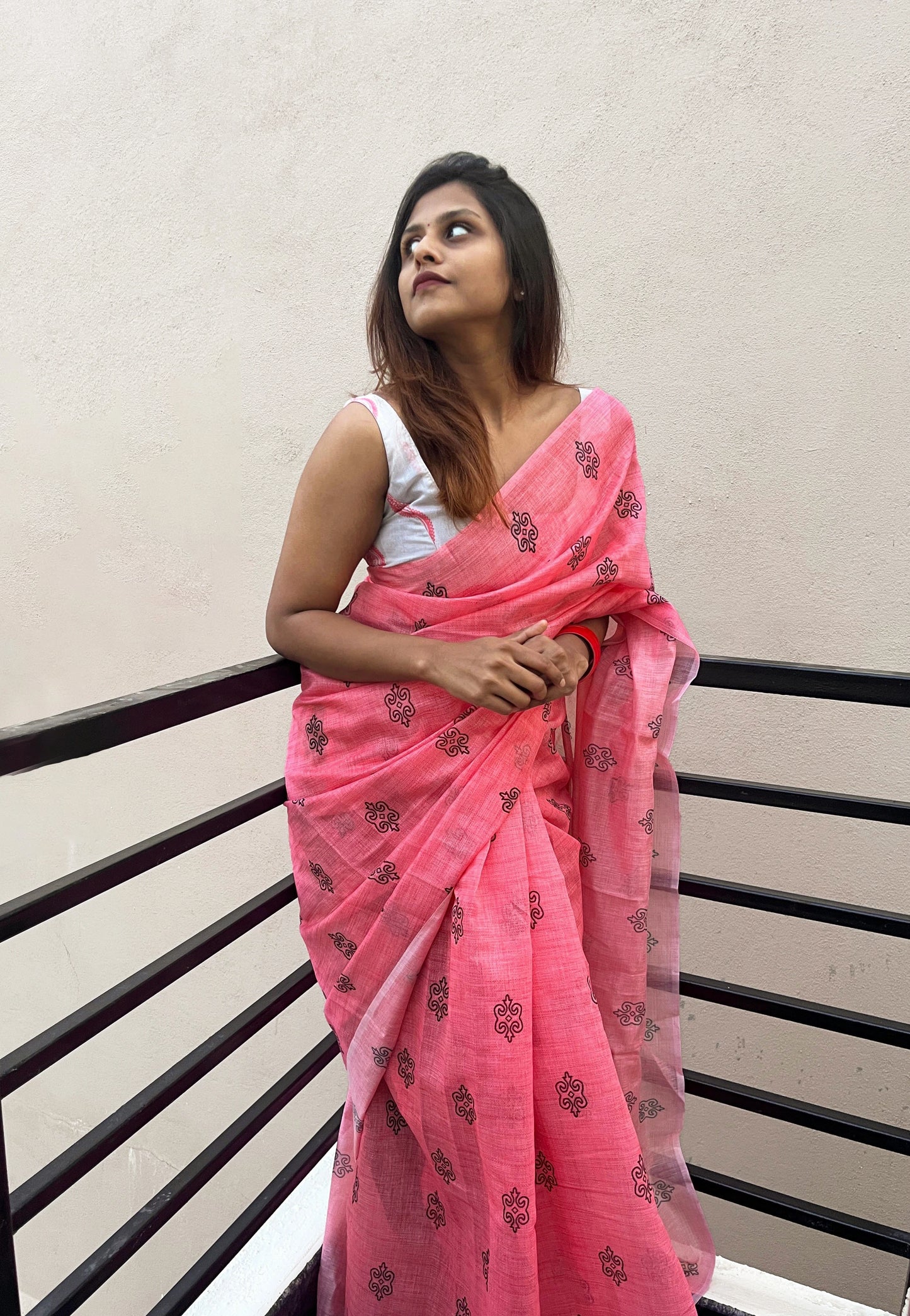 Pink Saree Paired with White Printed Blouse