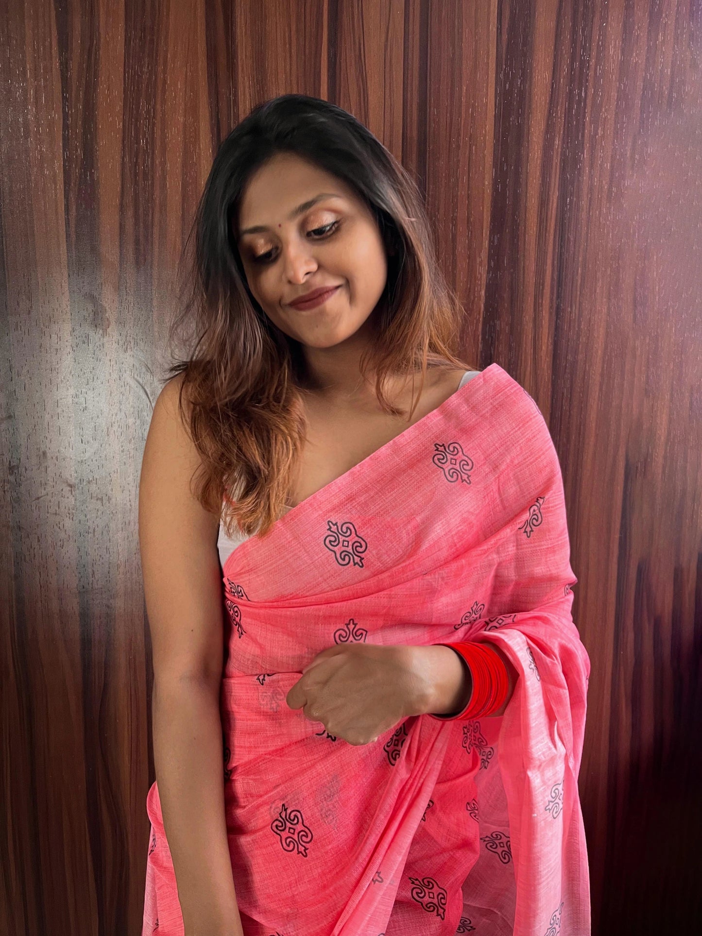Pink Saree Paired with White Printed Blouse