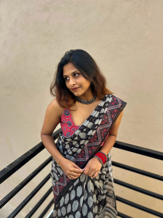 Black printed Cotton Mulmul Saree with Red blouse