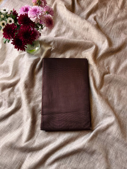 Brown Saree Paired With Dark Green Blouse